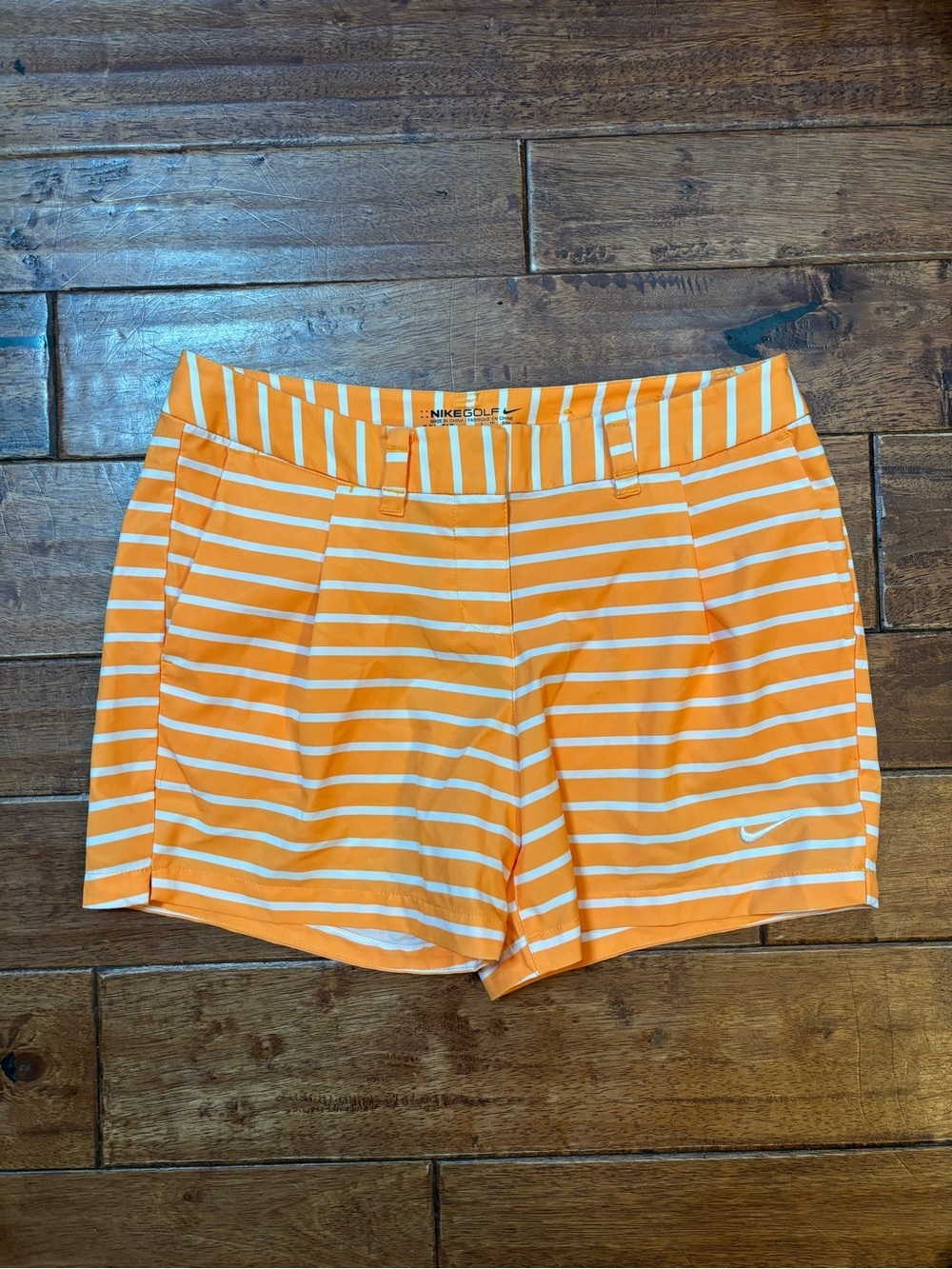 Nike Women’s Orange and White Striped Golf Shorts. 2
